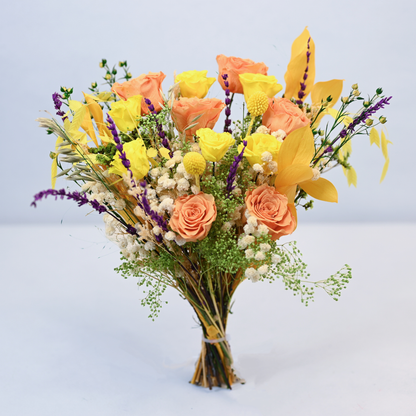 Citrus Meadow Preserved Flower Bouquet standing upright showing full arrangement of orange and yellow roses with lavender and baby's breath, front view