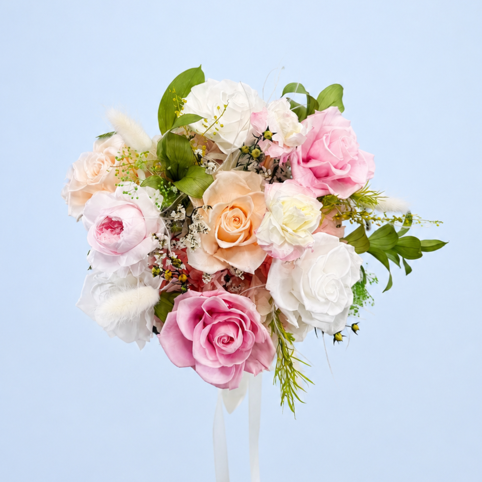 Aerial view of Rose Villa Petit Preserved Flower Bouquet featuring pink, white and peach roses, lisianthus, hydrangea and eucalyptus