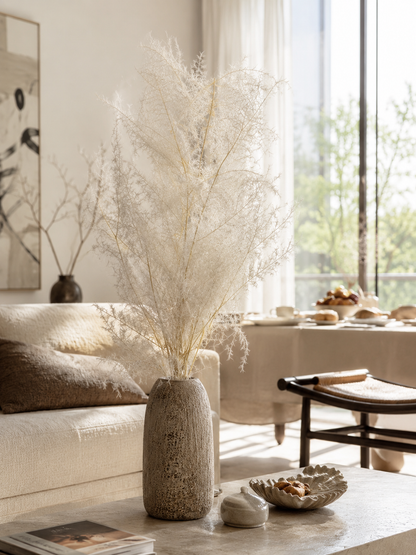 Preserved asparagus plumosus fern styled in a vase for home decor