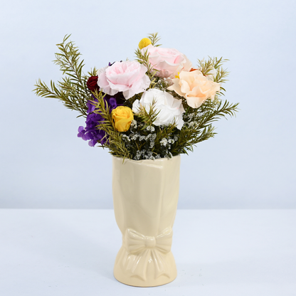 Rainbow Garden Petit Preserved Flower Bouquet displayed in a cream ceramic bow vase, front view